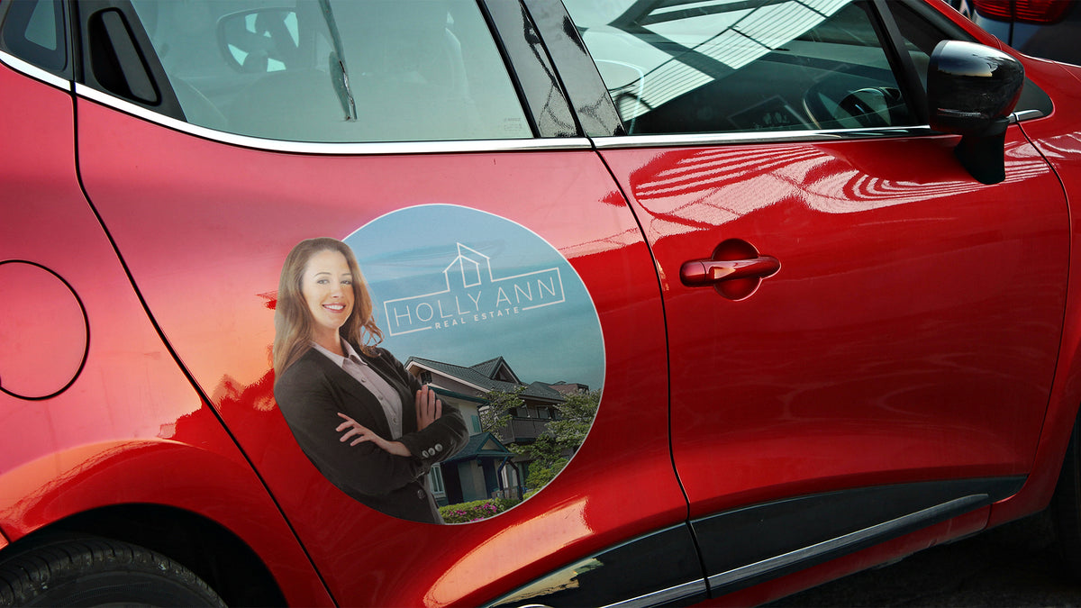 Circular wrap film graphic applied to a car door, conformed to the curve of the panel