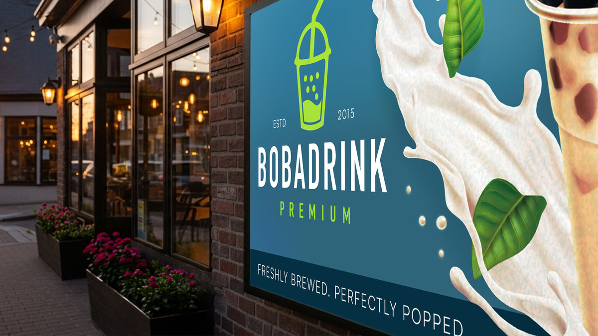Large backlit storefront sign glowing on a brick exterior at dusk