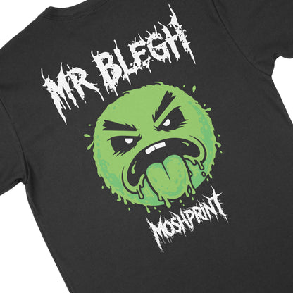 Angled close-up of Mr. Blegh green face graphic inspired by metalcore BLEGH vocals on black t-shirt